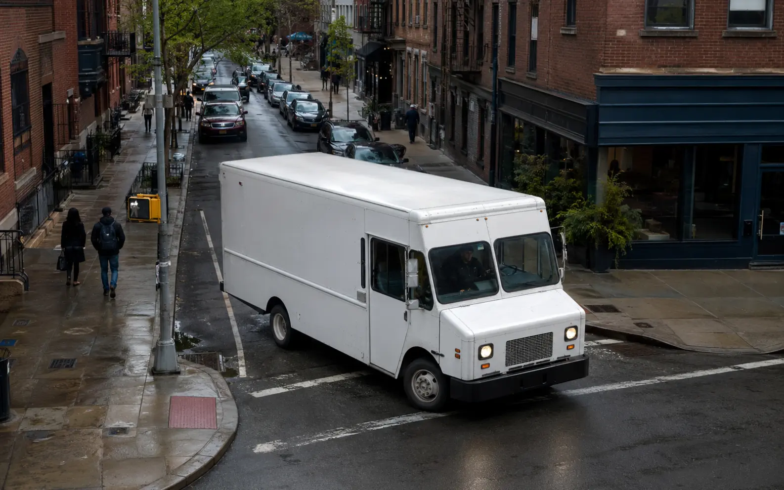 Commercial step van operating on a constrained urban delivery route